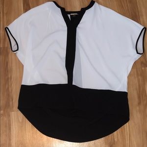 black and white sleeveless blouse